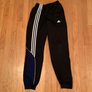 Black adidas sweatpants. Good condition with three white stripes running on side